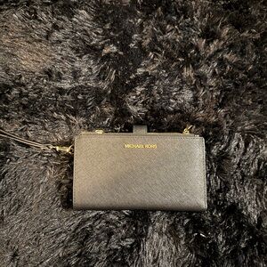 Michael Kors Black and Gold Wristlet
